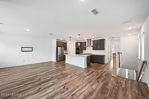Living - 11110 Diffusion Ct, Jacksonville, FL 32256 photo 4 of 7