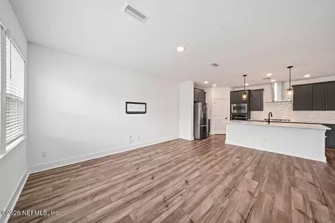 Living - 11110 Diffusion Ct, Jacksonville, FL 32256 photo 5 of 7