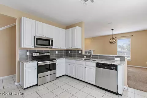 Kitchen - 360 Summit Dr, Orange Park, FL 32073 photo 2 of 3