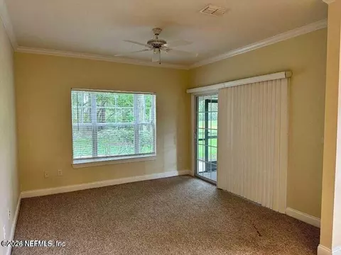 Living - 310 Ryder Cup Cir #101, Saint Augustine, FL 32092 photo 1 of 2