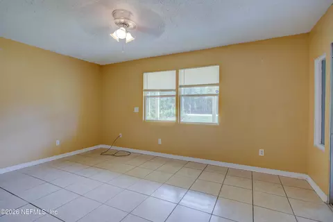 Living - 57022 Alderman Dr, Yulee, FL 32097 photo 6 of 7
