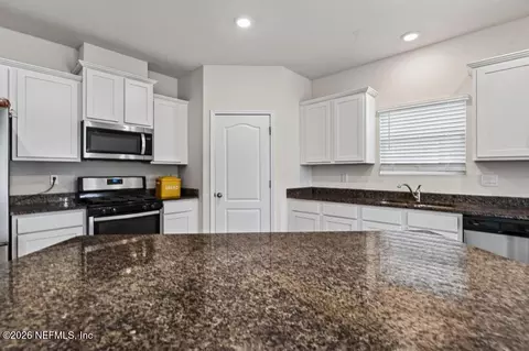 Kitchen - 86830 Iron Rail Ct, Yulee, FL 32097 photo 3 of 11