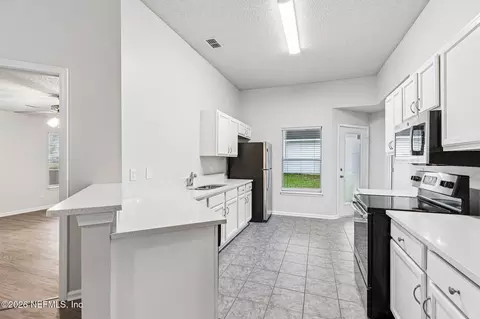 Kitchen - 451 Summit Dr, Orange Park, FL 32073 photo 3 of 4