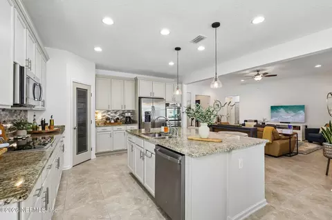 Kitchen - 448 Pine Eagle Dr, Fleming Island, FL 32003 photo 6 of 7