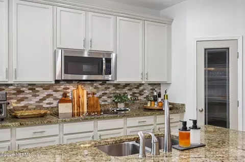 Kitchen - 448 Pine Eagle Dr, Fleming Island, FL 32003 photo 4 of 7