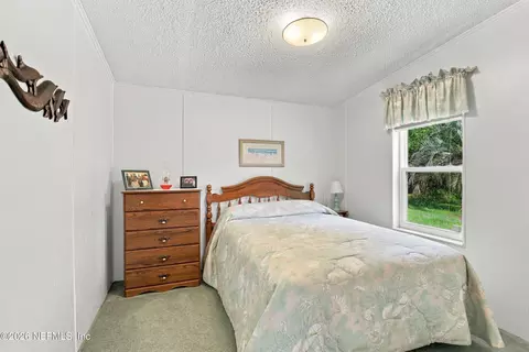 Bedroom - 119 Spanish Trl, Georgetown, FL 32139 photo 3 of 6