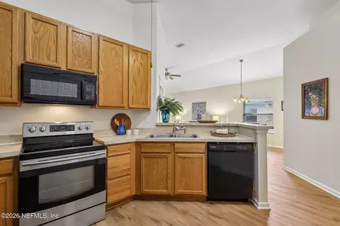 Kitchen - 2418 Old Pine Trl, Fleming Island, FL 32003 photo 3 of 5