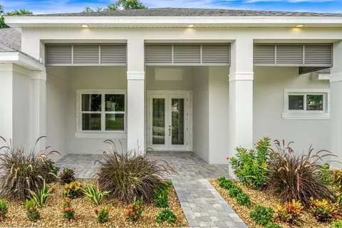 Exterior - 35 Loch Ness Dr, Rockledge, FL 32955 photo 4 of 7