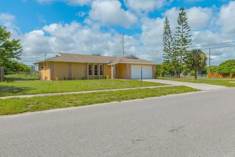 2049 W Ixora Dr W, Melbourne, FL 32935 photo 1