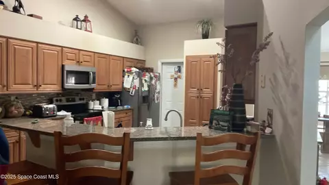 Kitchen - 4200 Tangelo Ave, Cocoa, FL 32926 photo 1 of 3