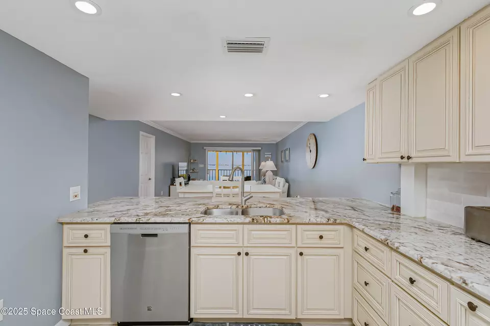 Kitchen - 190 Escambia Ln #402, Cocoa Beach, FL 32931 photo 3 of 4
