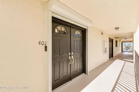 Entry Way - 190 Escambia Ln #402, Cocoa Beach, FL 32931 photo 1 of 3