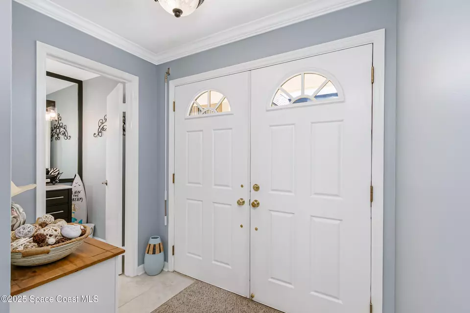 Entry Way - 190 Escambia Ln #402, Cocoa Beach, FL 32931 photo 2 of 3