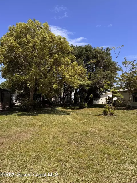 353 Marlin Cir, Barefoot Bay, FL 32976