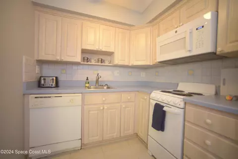 Kitchen - 171 Wakulla Ln #E, Cocoa Beach, FL 32931 photo 1 of 2