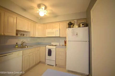Kitchen - 171 Wakulla Ln #E, Cocoa Beach, FL 32931 photo 2 of 2