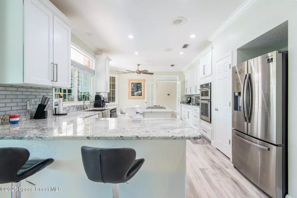Kitchen - 138 Windward Way, Indian Harbour Beach, FL 32937 photo 2 of 3