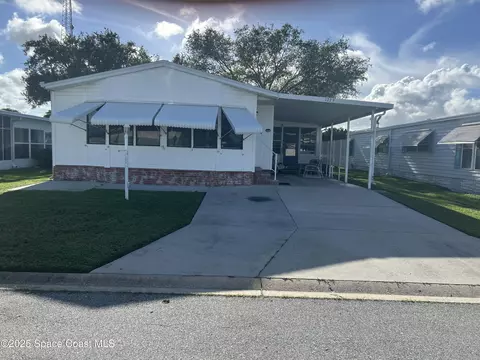 1229 Calusa Dr, Barefoot Bay, FL 32976