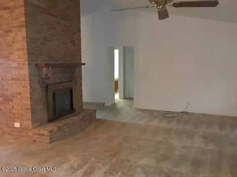 Living - 1173 Scyphers St NE, Palm Bay, FL 32905 photo 4 of 5