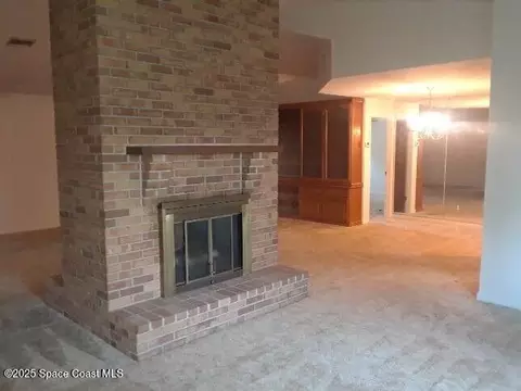 Living - 1173 Scyphers St NE, Palm Bay, FL 32905 photo 2 of 5