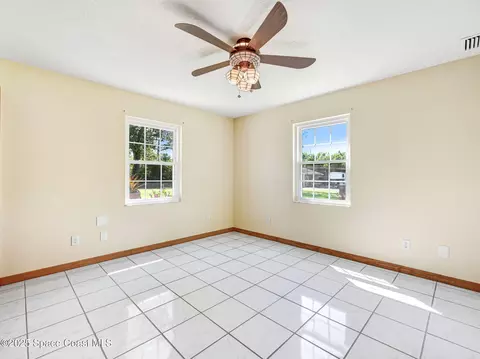 Bedroom - 6570 Whispering Pines Ln, Grant, FL 32949 photo 2 of 2