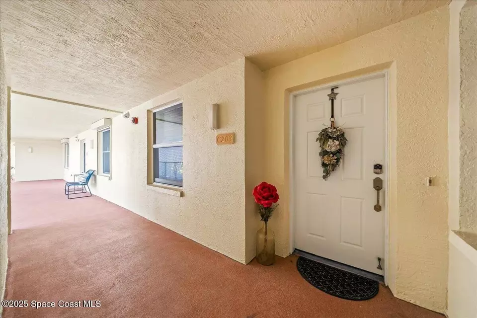 Entry Way - 104 Riverside Dr #203, Cocoa, FL 32922 photo 2 of 3