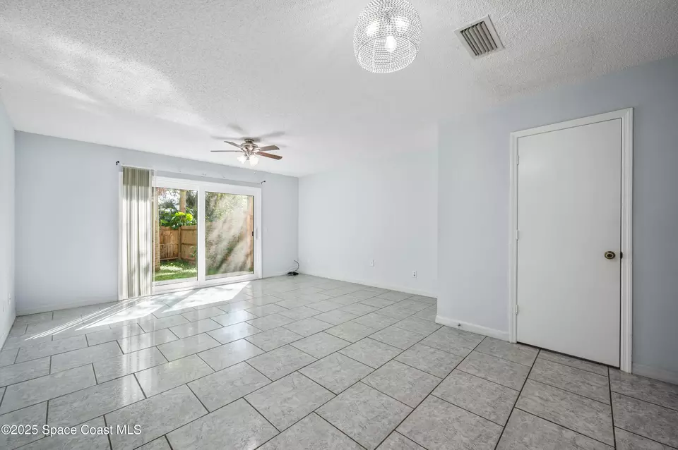 Living - 3431 Joe Murell Dr, Titusville, FL 32780 photo 2 of 3