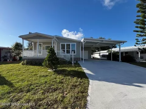 723 Hyacinth Cir, Barefoot Bay, FL 32976