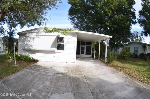 1056 Wren Cir, Barefoot Bay, FL 32976