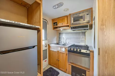 Kitchen - 4895 Orange St, Mims, FL 32754 photo 3 of 3