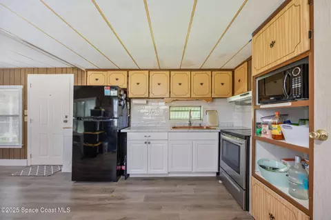 Kitchen - 4895 Orange St, Mims, FL 32754 photo 2 of 3