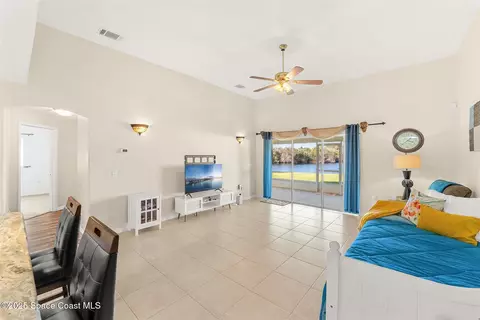 Living - 5188 Wexford Dr, Rockledge, FL 32955 photo 8 of 11