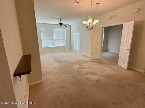 Living - 3868 Lexmark Ln #309, Rockledge, FL 32955 photo 2 of 2