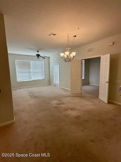Living - 3868 Lexmark Ln #309, Rockledge, FL 32955 photo 1 of 2