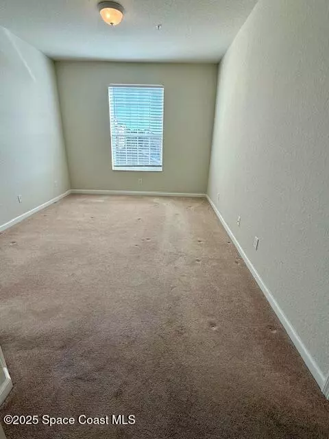 Bedroom - 3868 Lexmark Ln #309, Rockledge, FL 32955 photo 1 of 2