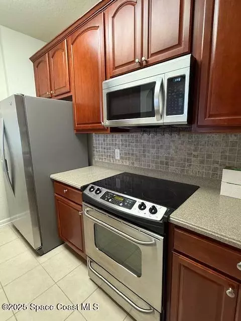 Kitchen - 3868 Lexmark Ln #309, Rockledge, FL 32955 photo 4 of 5