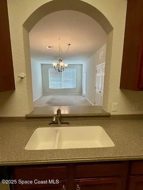 Kitchen - 3868 Lexmark Ln #309, Rockledge, FL 32955 photo 3 of 5