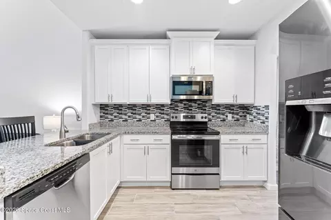 Kitchen - 1415 Lara Cir #106, Rockledge, FL 32955 photo 2 of 3