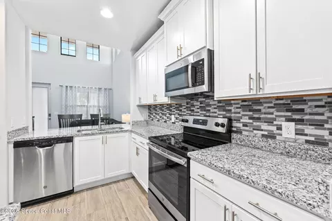 Kitchen - 1415 Lara Cir #106, Rockledge, FL 32955 photo 3 of 3