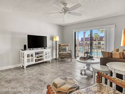 Living - 170 Paradise Blvd #17014, Indialantic, FL 32903 photo 1 of 2