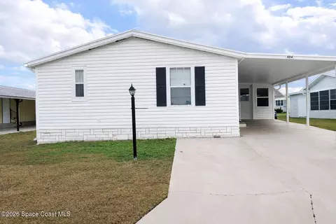 494 Papaya Cir, Barefoot Bay, FL 32976