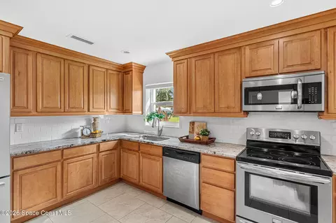 Kitchen - 135 Oakledge Dr, Rockledge, FL 32955 photo 4 of 4