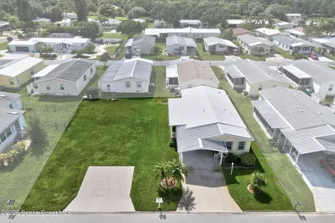 835 Sapodilla Dr, Barefoot Bay, FL 32976
