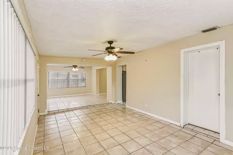 Living - 545 Westminster Ave, Melbourne, FL 32935 photo 9 of 11