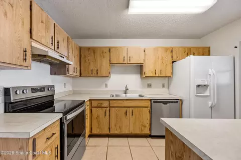 Kitchen - 2016 Manor Dr NE, Palm Bay, FL 32905 photo 2 of 3