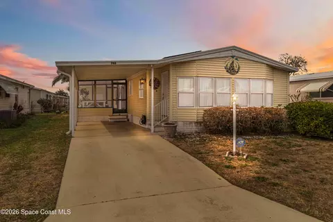 703 Amaryllis Dr, Barefoot Bay, FL 32976
