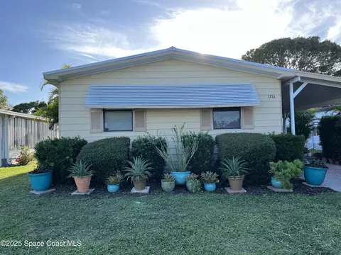 1216 Gardenia Dr, Barefoot Bay, FL 32976