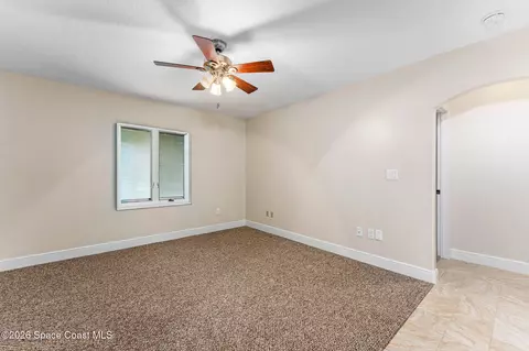 Living - 1711 Flamevine Pl, Malabar, FL 32950 photo 5 of 6