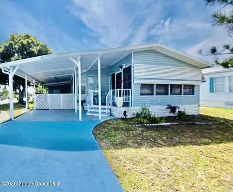 701 Gladiolus Dr, Barefoot Bay, FL 32976