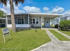 939 Laurel Cir, Barefoot Bay, FL 32976
